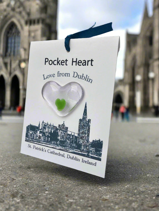 Heart-shaped object with a green heart inside, on a card with 'Pocket Heart Love from Dublin' text and St. Patrick's Cathedral illustration.